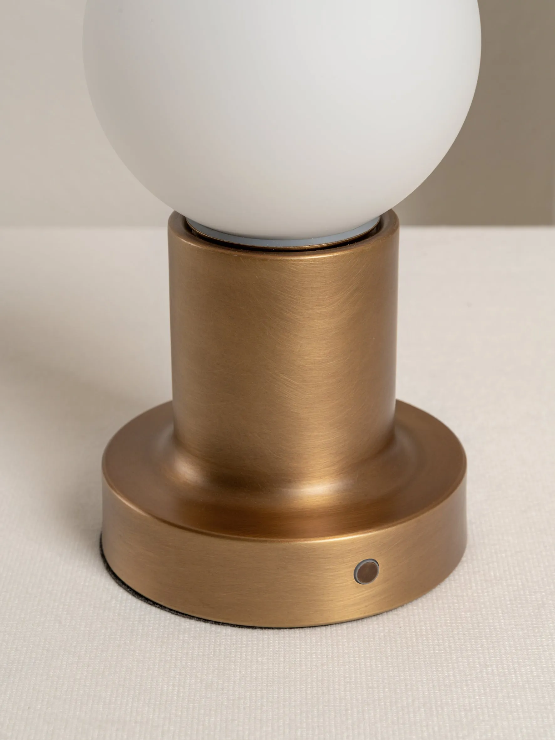 Porta - aged brass and opal rechargeable table lamp